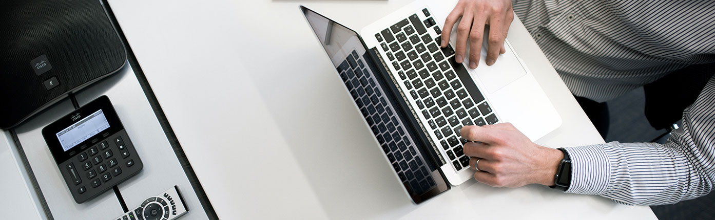 Someone working on computer banner-01